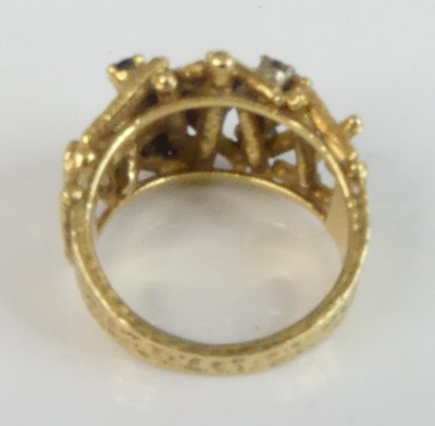 Lot 108 - An 18ct yellow gold, sapphire and diamond...