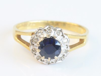 Lot 2622 - An 18ct yellow and white gold, sapphire and...