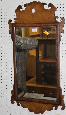 Lot 1148 - An early 20th century figured walnut framed...