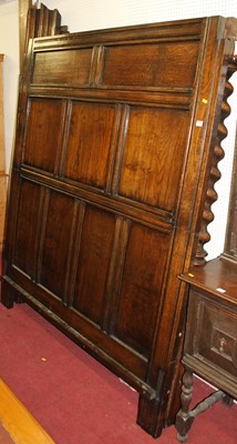 Lot 1152 - A joined oak panelled double full tester bed,...