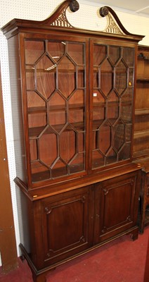 Lot 1156 - A 19th century mahogany bookcase cupboard,...