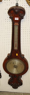 Lot 1162 - A mid-Victorian floral carved mahogany...