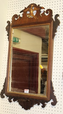 Lot 1166 - A 19th century faded mahogany fret carved wall...