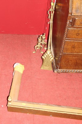 Lot 1205 - A circa 1900 brass curb fender, w.155cm,...