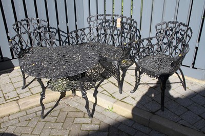 Lot 1181 - A black painted pierced galvanised metal...