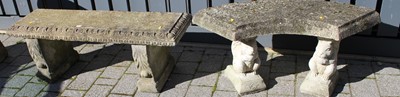 Lot 1182 - A reconstituted stone garden bench seat,...