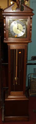 Lot 1212 - A reproduction mahogany grandmother clock,...