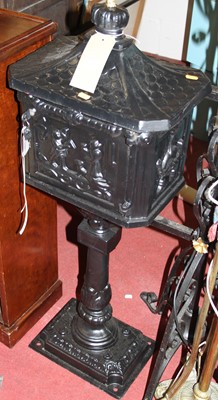 Lot 1216 - A freestanding contemporary black painted cast...