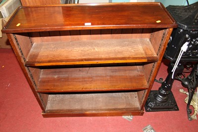 Lot 1217 - A mahogany dwarf freestanding open bookshelf,...