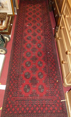 Lot 1190 - A Persian style machine woven red ground...