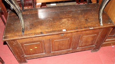 Lot 1222 - An 18th century joined oak three-panelled...