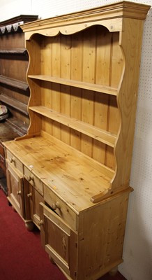 Lot 1153 - A modern pine kitchen dresser, width 133cm