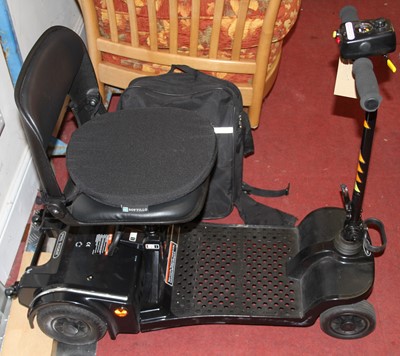 Lot 1198 - A battery powered mobility scooter, with...