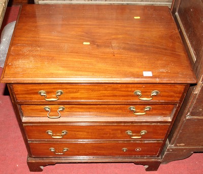 Lot 1231 - A 19th century mahogany chest of four long...