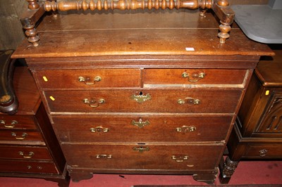 Lot 1233 - A circa 1800 provincial oak chest of two short...
