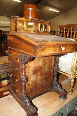 Lot 1282 - A mid-Victorian figured walnut slopefront...