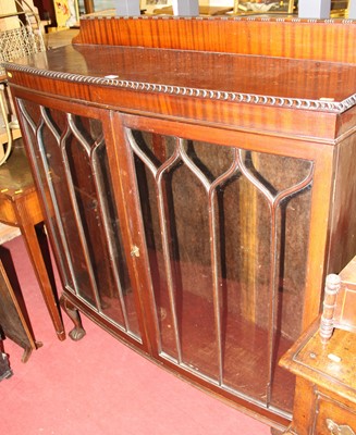 Lot 1247 - A 1930s mahogany bowfront ledgeback double...