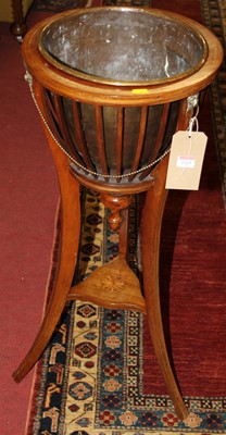 Lot 1265 - An Edwardian mahogany cylindrical jardiniere...