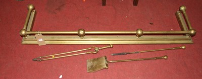 Lot 1335 - A late Victorian tubular brass kerb fender,...