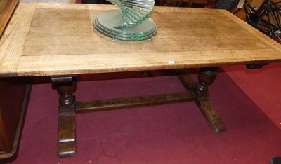 Lot 1343 - An early 20th century oak refectory dining...
