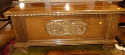 Lot 1346 - A contemporary Italian walnut relief carved...