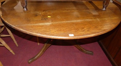 Lot 1350 - A contemporary oak circular breakfast table,...
