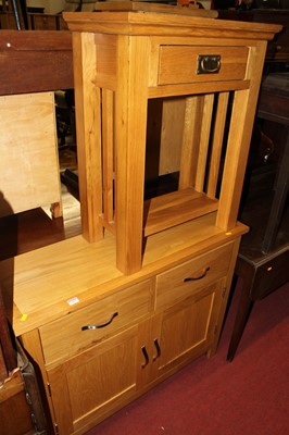 Lot 1292 - A contemporary light oak double door side...