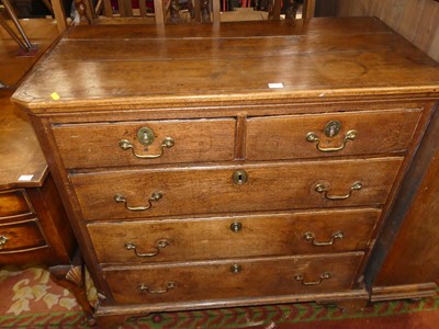 Lot 1375 - A circa 1800 provincial oak chest of two short...