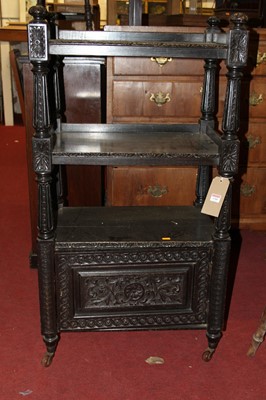Lot 1300 - A circa 1900 relief carved and ebonised oak...