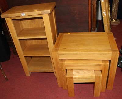 Lot 1304 - A contemporary small light oak low narrow...