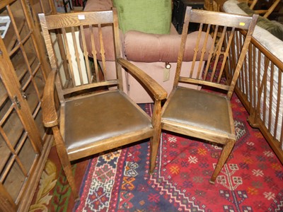 Lot 1386 - A set of six 1930s oak slatback dining chairs...