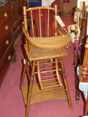 Lot 1402 - An early 20th century beech stickback child's...