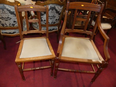 Lot 1410 - A late Victorian walnut barback elbow chair;...