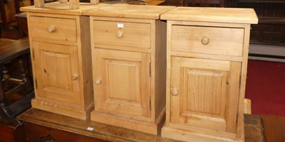 Lot 1418 - A set of three contemporary pine single door...