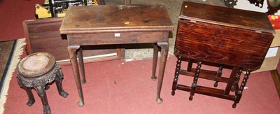 Lot 1435 - A George III mahogany foldover tea table,...