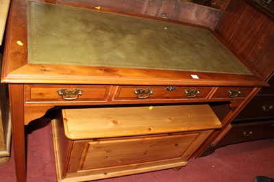Lot 1444 - A reproduction yew wood and gilt tooled green...