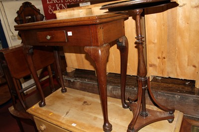 Lot 1445 - A George III mahogany foldover tea table,...