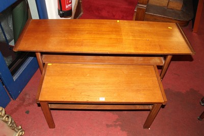 Lot 1448 - Two 1960s teak two-tier coffee tables