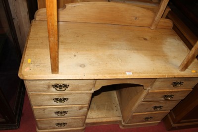 Lot 1451 - A Victorian pine round cornered ledgeback...