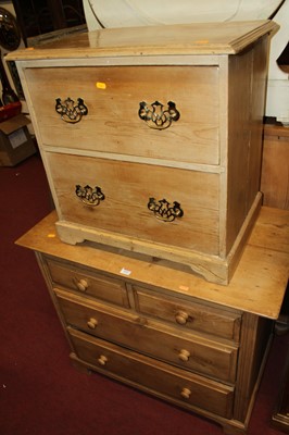 Lot 1457 - A small 19th century pine low chest of two...