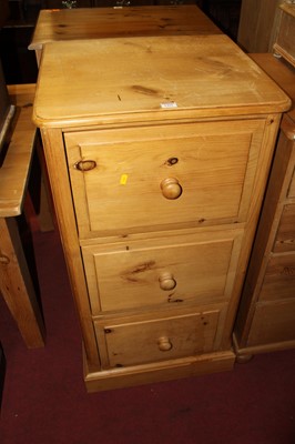 Lot 1461 - A modern pine round cornered three drawer...