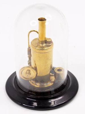 Lot 4 - A miniature kit built model of a spirit fired...