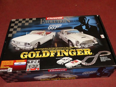 Lot 1584 - A Carerra Evolution Goldfinger James Bond 007...