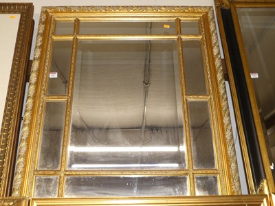Lot 1021 - A reproduction gilt composition framed...