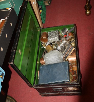 Lot 692 - A vintage tin trunk, containing a collection...