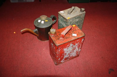 Lot 694 - A vintage Pratt petrol canister, together with...