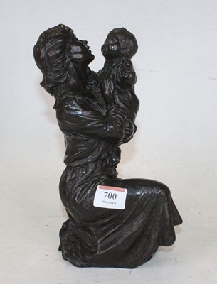 Lot 700 - A bronzed figure group of a mother and child,...