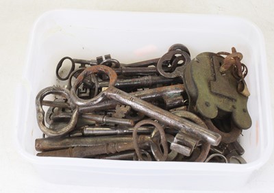 Lot 702 - A collection of vintage iron keys