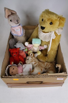 Lot 723 - A collection of vintage stuffed toys, to...