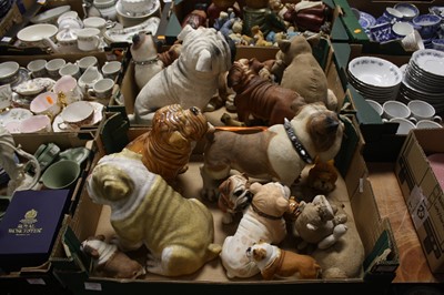 Lot 735 - A collection of various resin models of dogs